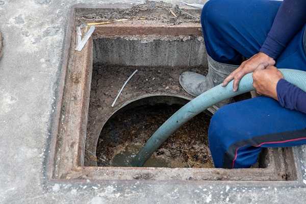 during grease trap pumping, a vacuum truck is used to remove the accumulated grease and waste from the trap, which is then properly disposed of